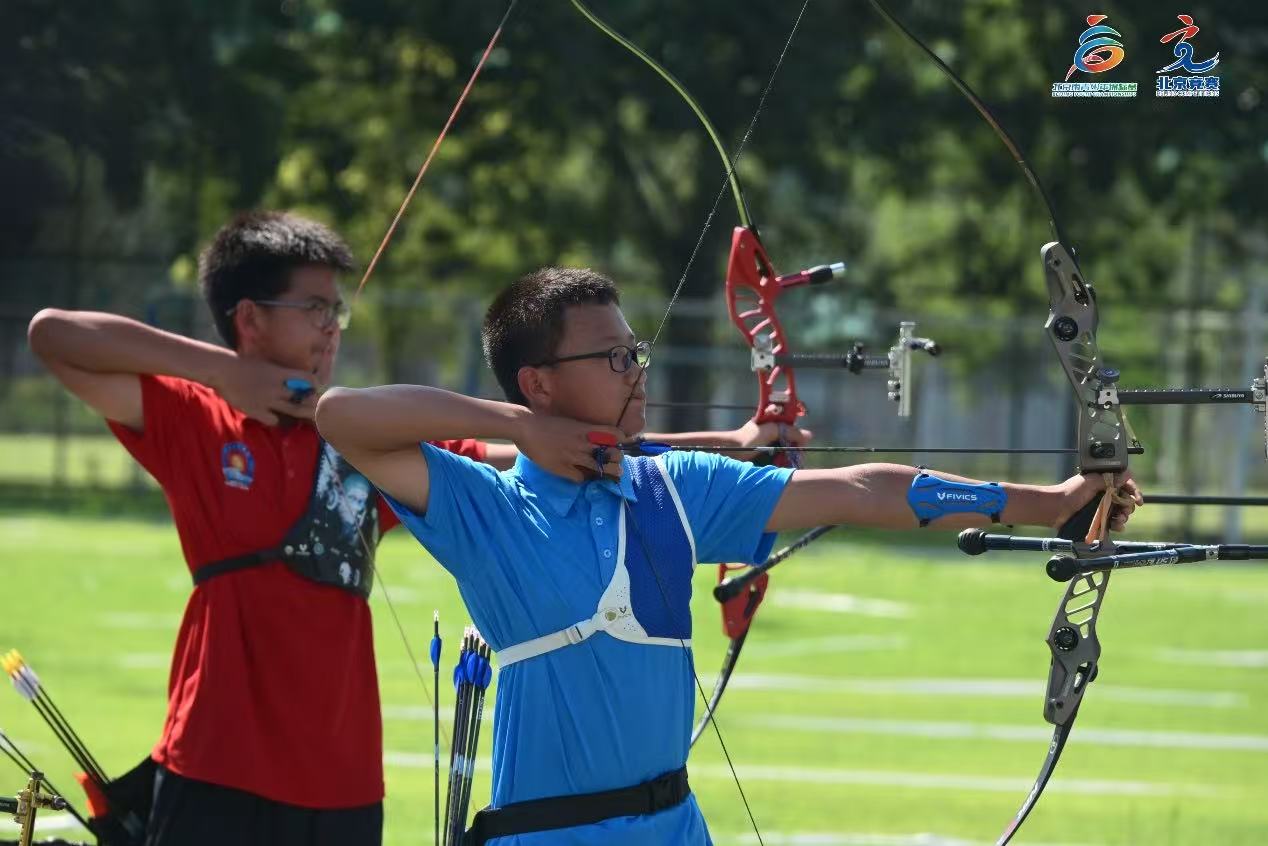 在教练鼓励, 射箭运动对, 为北京乃至